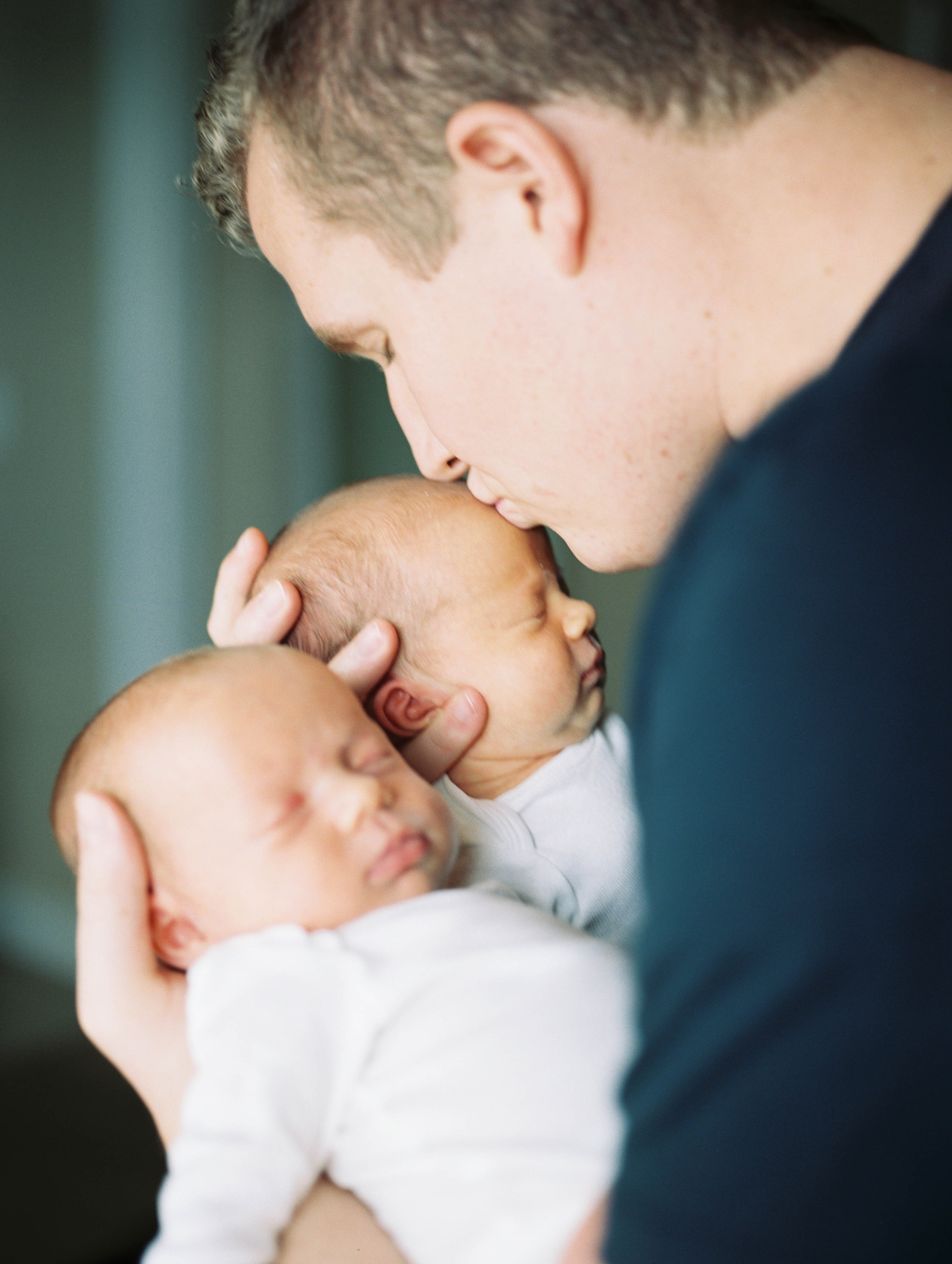 newborn twins and dad