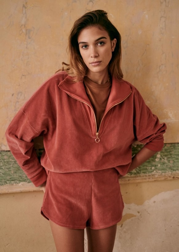 mauve short and half zip set from sezane